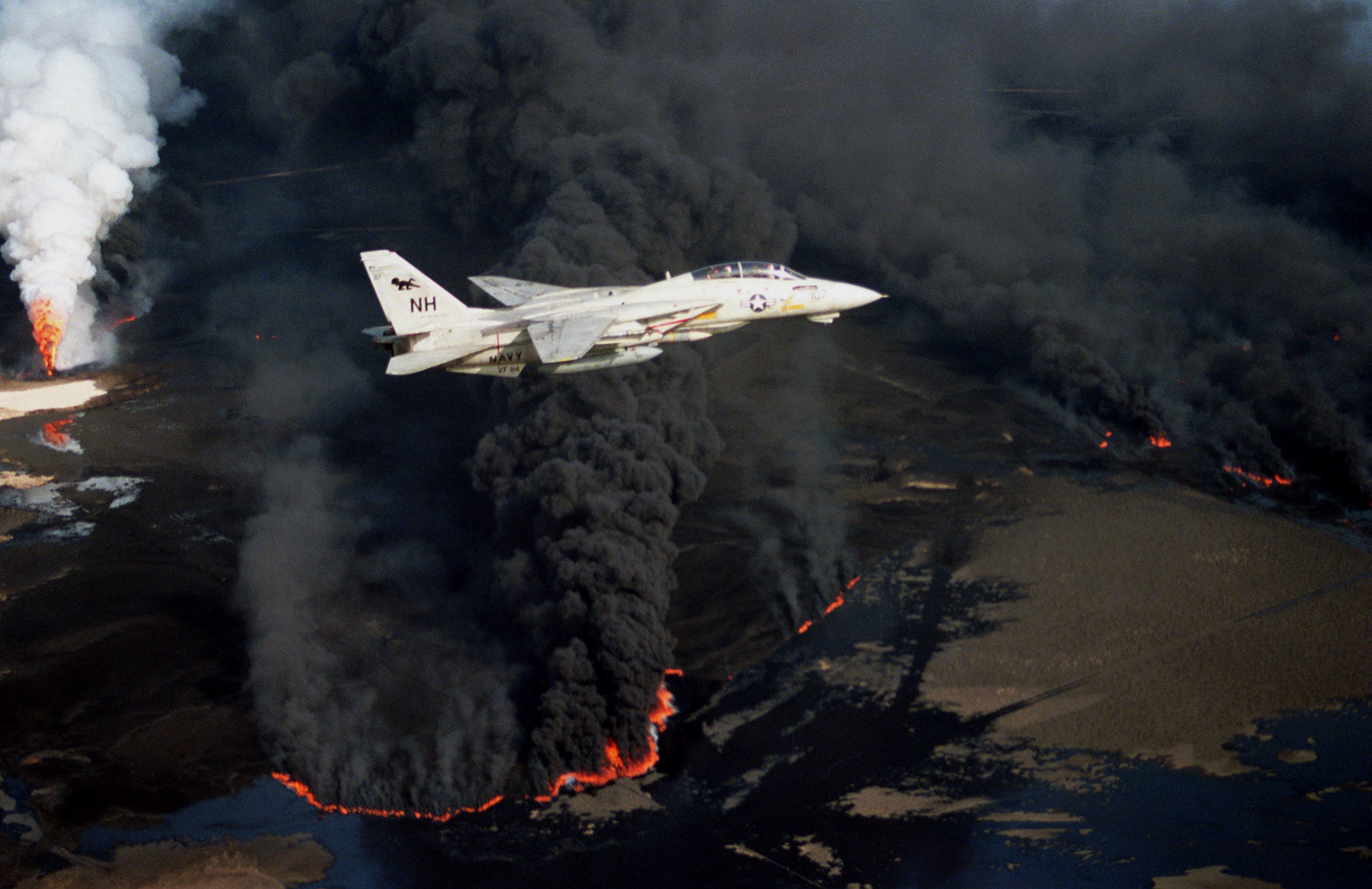 f-14a_vf-114_over_burning_kuwaiti_oil_well_1991-1.jpg